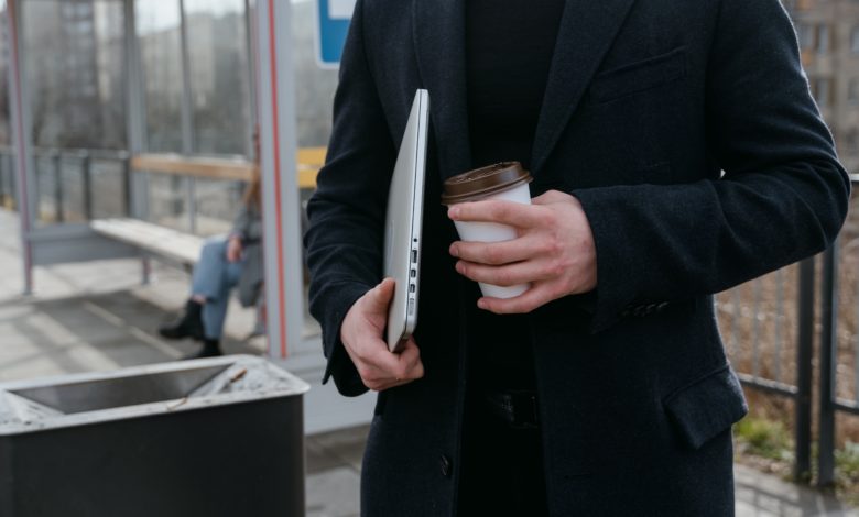 man holding his Mac Pro